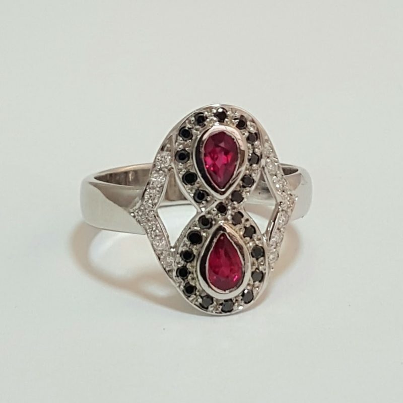 Marry Me Package C : Platinum featuring a pair of pear rubies with a black and white diamond mele